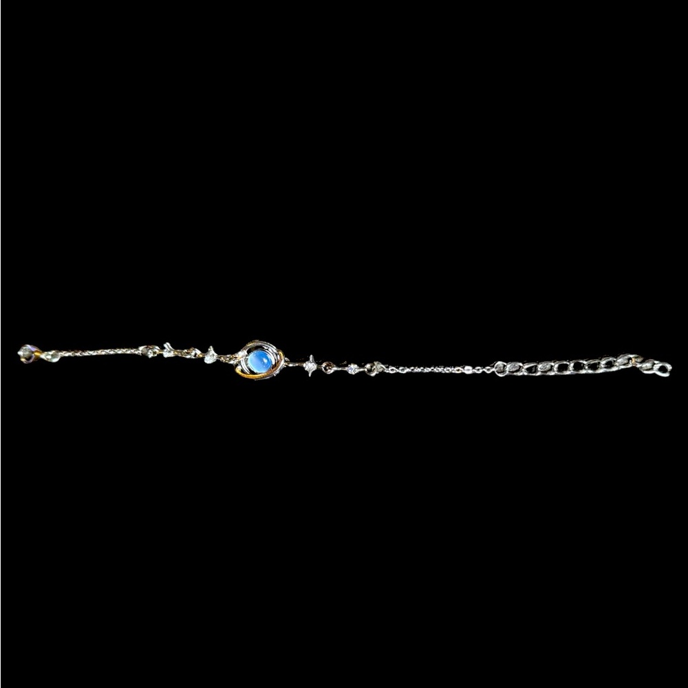Silvertone bracelet blue stone New